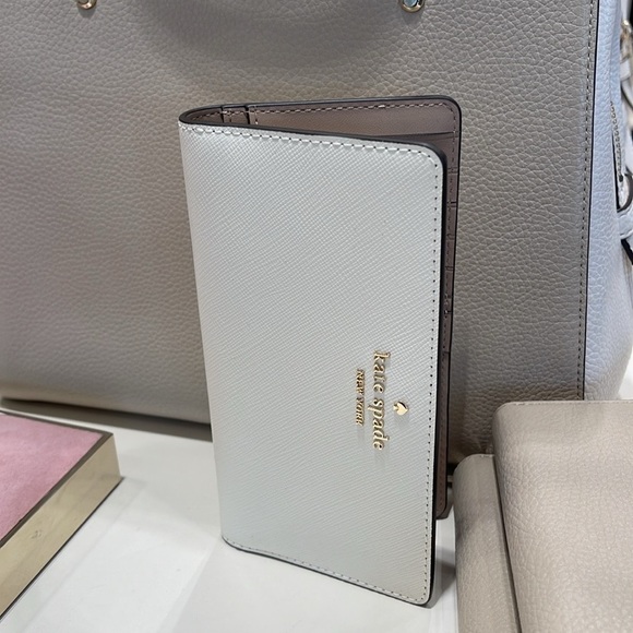 Kate Spade Madison Large Slim Bifold Wallet
Meringue 
NWT - Picture 8 of 16